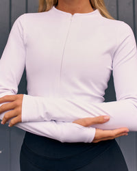 Woman wearing Sculpt Full Zip Long Sleeve Top - White | Model:Amity | Size:S | Thumbnail Index: 3