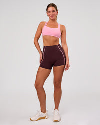 Woman wearing Velocity Sports Bra - Pink Rose | Model:Amity | Size:S | Thumbnail Index: 4