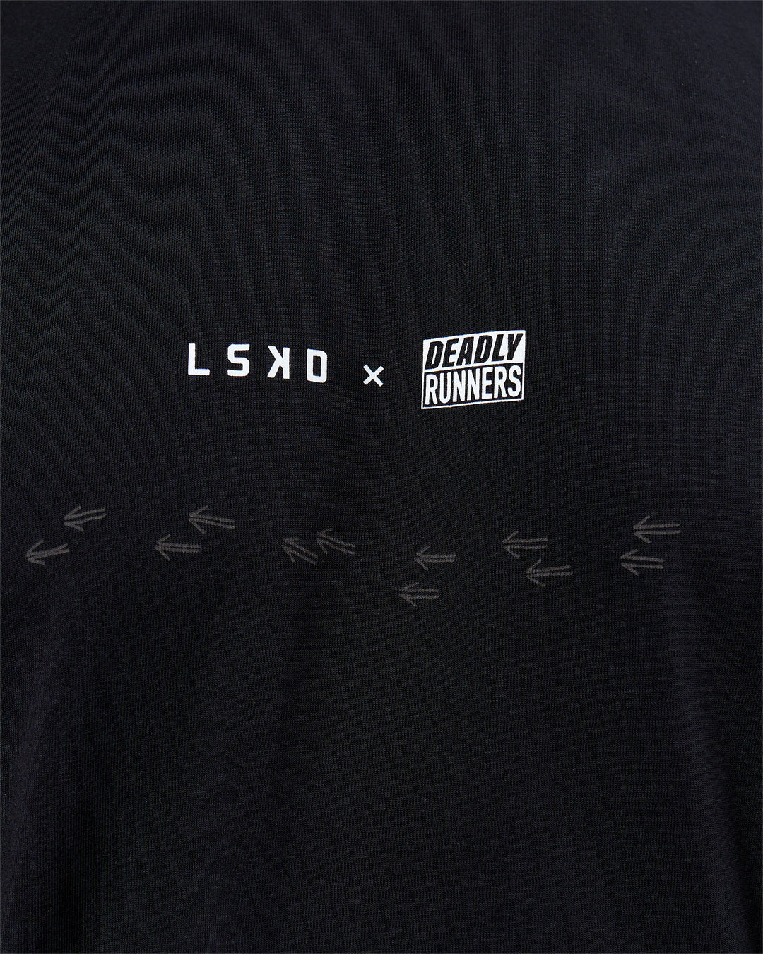 Woman wearing Deadly Runners Run Club FLXCotton Oversize Tee - Black | Model:Bella | Size:S - view 10