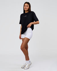 Woman wearing Deadly Runners Run Club FLXCotton Oversize Tee - Black | Model:Bella | Size:S | Thumbnail Index: 15