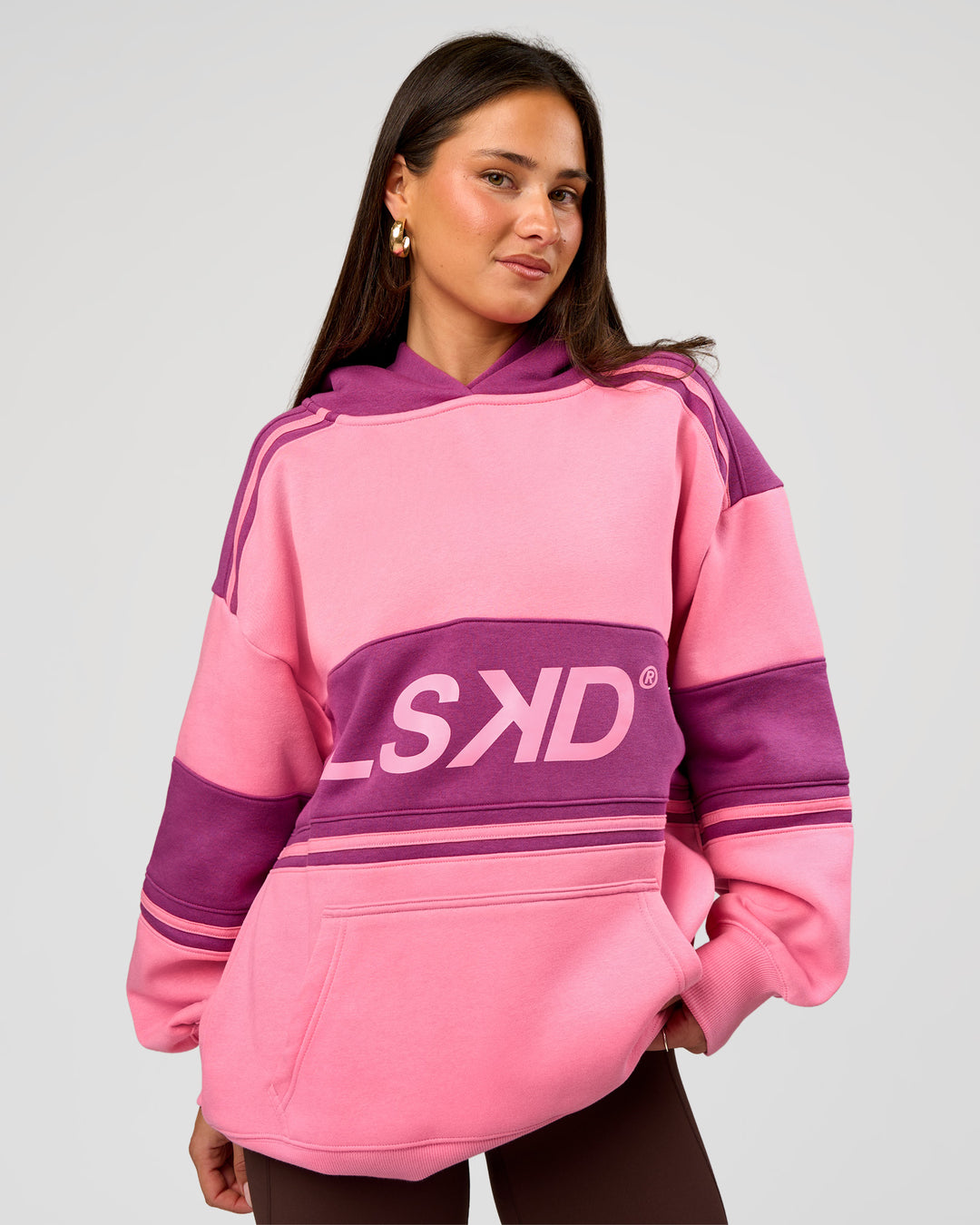 Woman wearing A-Team Oversized Hoodie - Candy Pink-Boysenberry | Model:Bianca | Size:S - view 3