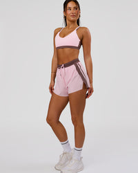 Woman wearing Accelerate 3" Force High-Rise Running Short - Marshmallow-Cocoa Powder | Model:Bianca | Size:S | Thumbnail Index: 0
