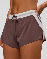 Woman wearing Accelerate 3" Force Mid-Rise Running Short - Cocoa Powder | Model:Bianca | Size:S | Thumbnail Index: 0
