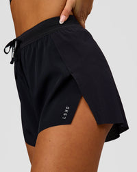 Woman wearing Accelerate 3" High-Rise Running Short - Black | Model:Bianca | Size:S