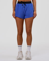 Woman wearing Accelerate 3" High-Rise Running Short - Black-Power Cobalt | Model:Bianca | Size:S | Thumbnail Index: 5