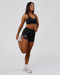Woman wearing Accelerate 3" High-Rise Running Short - Black-Tech Department | Model:Bianca | Size:S | Thumbnail Index: 3