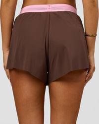 Woman wearing Accelerate 3" High-Rise Running Short - Neapolitan | Model:Bianca | Size:S | Thumbnail Index: 8