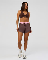 Woman wearing Accelerate 3" High-Rise Running Short - Neapolitan | Model:Bianca | Size:S | Thumbnail Index: 6