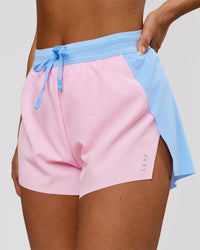 Woman wearing Accelerate 3" High-Rise Running Short - Open Air-Marshmallow | Model:Bianca | Size:S | Thumbnail Index: 0