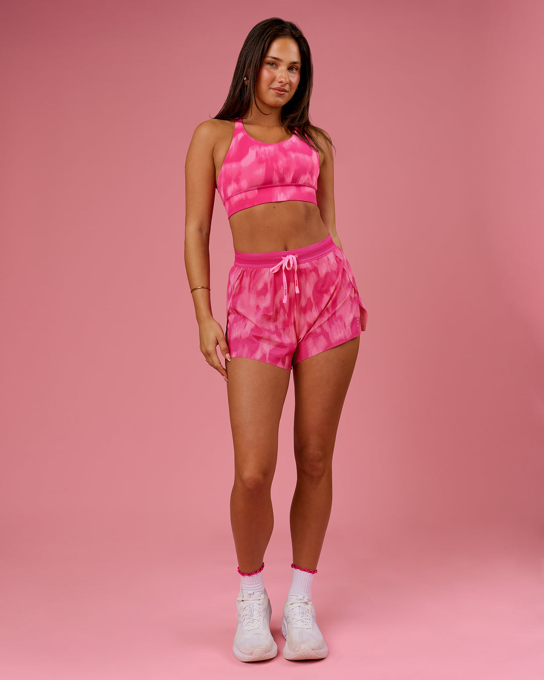 Woman wearing Accelerate 3" High-Rise Running Short - Radiant Pink | Model:Bianca | Size:S - view 16