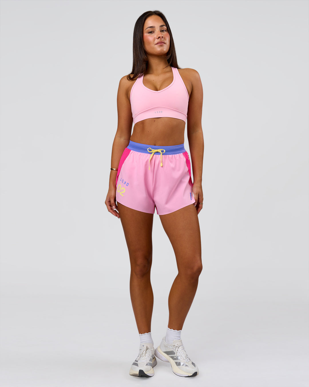 Woman wearing Accelerate 3" High-Rise Running Short - Ultra Pink-Tech Department | Model:Bianca | Size:S - view 6