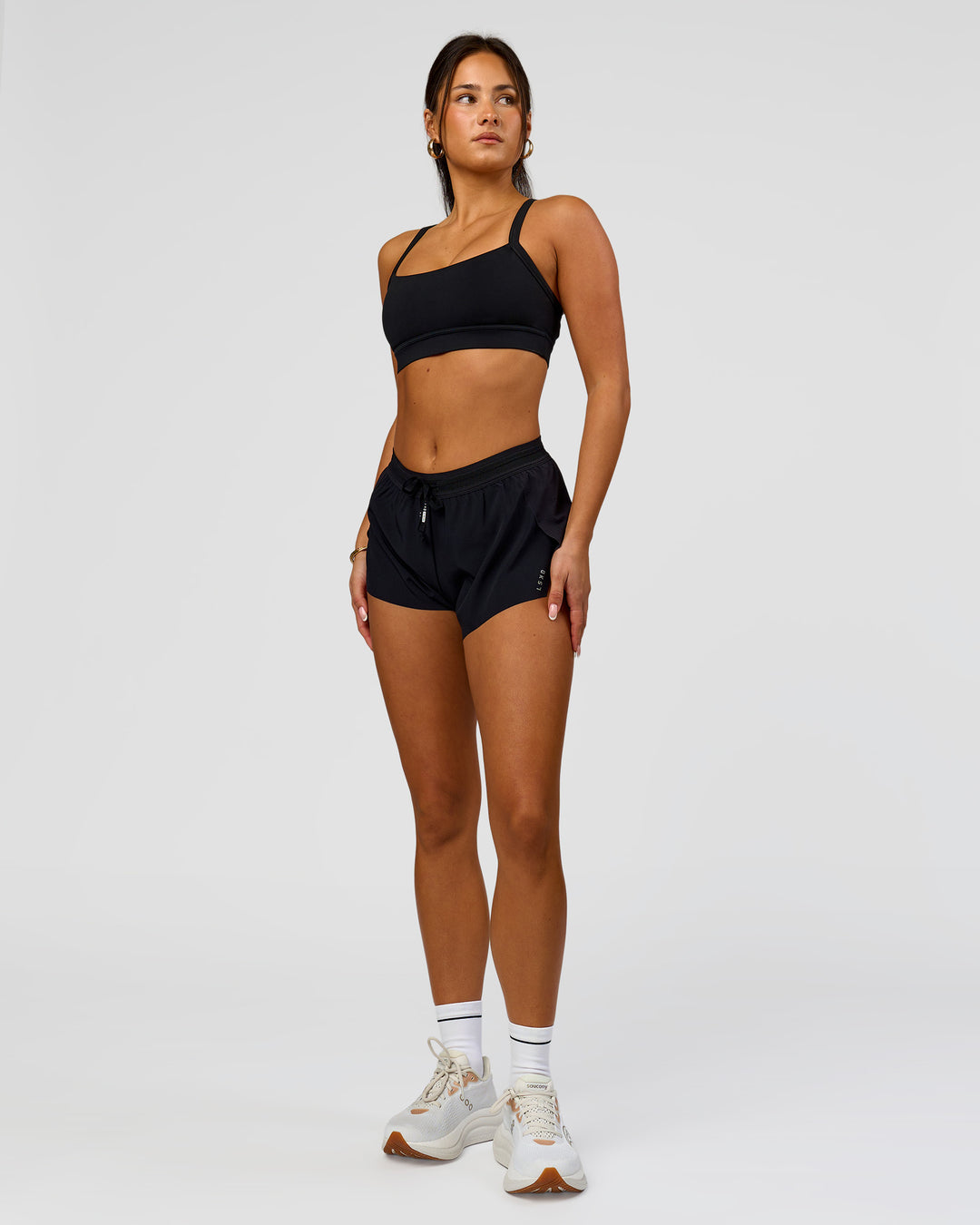 Woman wearing Accelerate 3" Mid-Rise Running Short - Black | Model:Bianca | Size:S