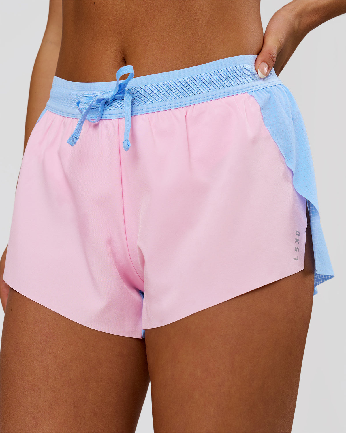 Woman wearing Accelerate 3" Mid-Rise Running Short - Open Air-Marshmallow | Model:Bianca | Size:S - view 1