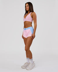 Woman wearing Accelerate 3" Mid-Rise Running Short - Open Air-Marshmallow | Model:Bianca | Size:S | Thumbnail Index: 2