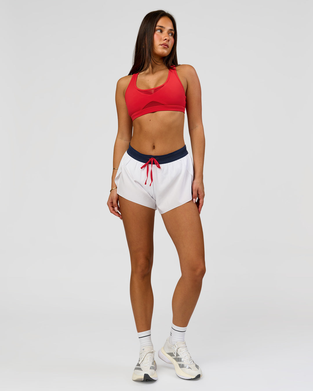 Woman wearing Accelerate 3" Mid-Rise Running Short - White-Future Navy | Model:Bianca | Size:S - view 5