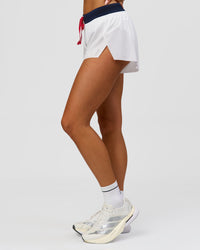Woman wearing Accelerate 3" Mid-Rise Running Short - White-Future Navy | Model:Bianca | Size:S | Thumbnail Index: 6