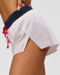Woman wearing Accelerate 3" Mid-Rise Running Short - White-Future Navy | Model:Bianca | Size:S | Thumbnail Index: 7