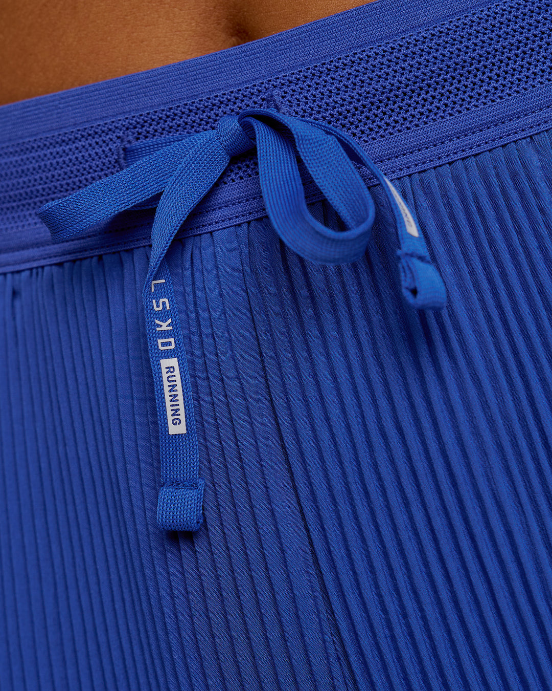 Woman wearing Accelerate 3" Pleated High-Rise Running Short - Power Cobalt | Model:Bianca | Size:S - view 9