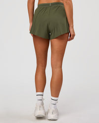 Woman wearing Accelerate 3" High-Rise Running Short - Pure Olive-Fog | Model:Bianca | Size:S | Thumbnail Index: 6
