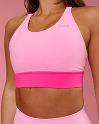 Woman wearing Accelerate Split Strap Sports Bra - Pink Rose-Ultra Pink | Model:Bianca | Size:S | Thumbnail Index: 2