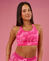Woman wearing Accelerate Sports Bra - Radiant Pink | Model:Bianca | Size:S | Thumbnail Index: 0