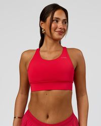 Woman wearing Accelerate Sports Bra - Scarlet | Model:Bianca | Size:S
