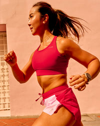 Woman wearing Accelerate Sports Bra - Scarlet | Model:Bianca | Size:S