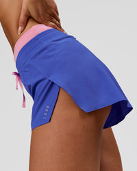 Woman wearing Accelerate Synergy 3" Running Short Short - Power Cobalt-Pink Rose | Model:Bianca | Size:S | Thumbnail Index: 8