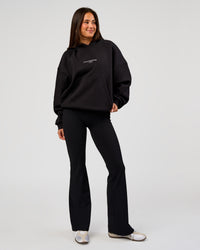 Woman wearing Andrew J. Steel x LSKD Boxy Hoodie - Black | Model:Bianca | Size:S | Thumbnail Index: 9