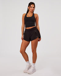 Woman wearing Aura Mesh Shelf Bra Tank - Black | Model:Bianca | Size:S | Thumbnail Index: 4