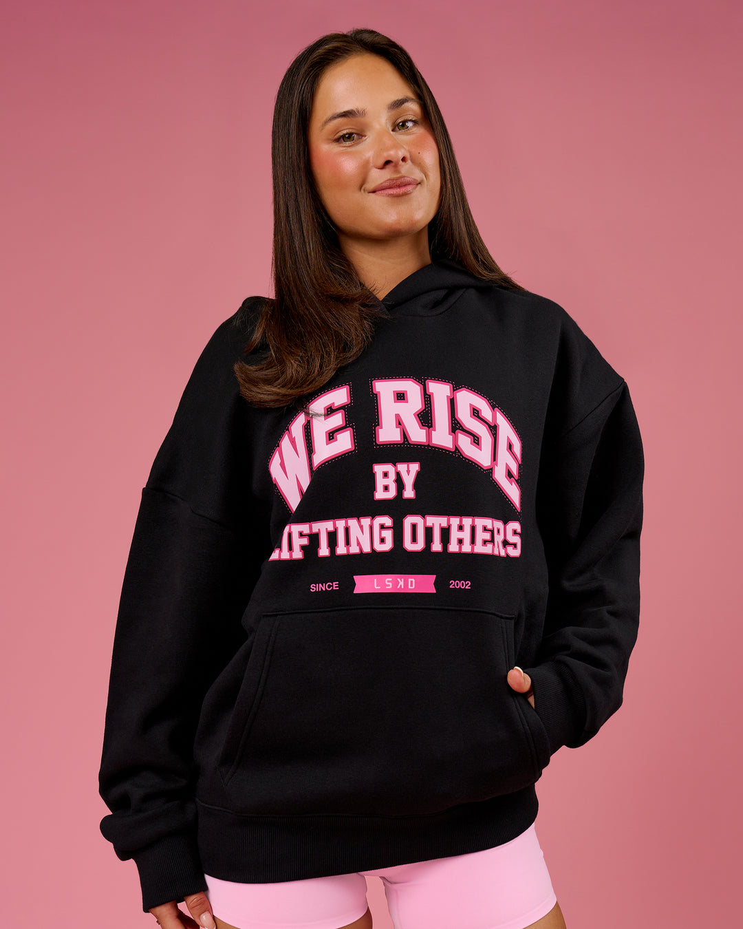 Woman wearing BCAM Unisex Oversized Hoodie - Black | Model:Bianca | Size:S - view 3