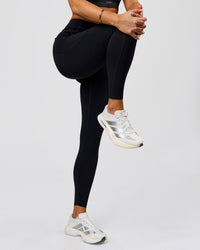 Woman wearing Elite Run High-Rise Full Length Legging Pockets - Black | Model:Bianca | Size:S | Thumbnail Index: 1