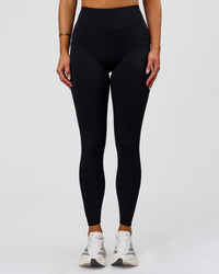 Woman wearing Elite Run High-Rise Full Length Legging Pockets - Black | Model:Bianca | Size:S | Thumbnail Index: 4