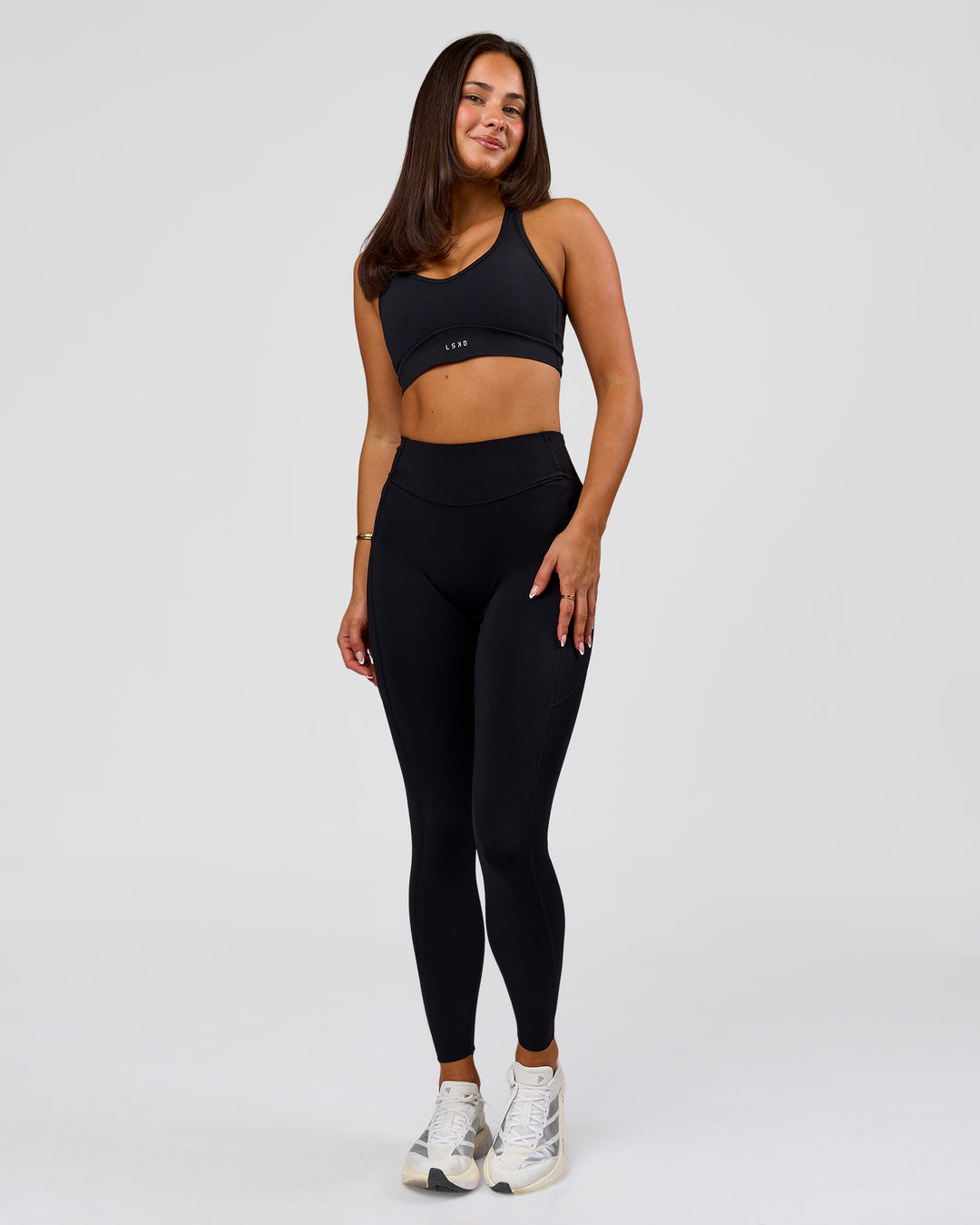 Woman wearing Elite Run High-Rise Full Length Legging Pockets - Black | Model:Bianca | Size:S - view 10