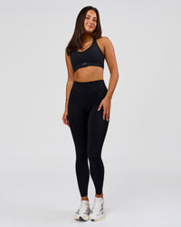 Woman wearing Elite Run High-Rise Full Length Legging Pockets - Black | Model:Bianca | Size:S | Thumbnail Index: 9