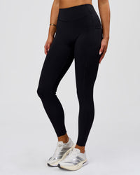 Woman wearing Elite Run High-Rise Full Length Legging Pockets - Black | Model:Bianca | Size:S | Thumbnail Index: 10