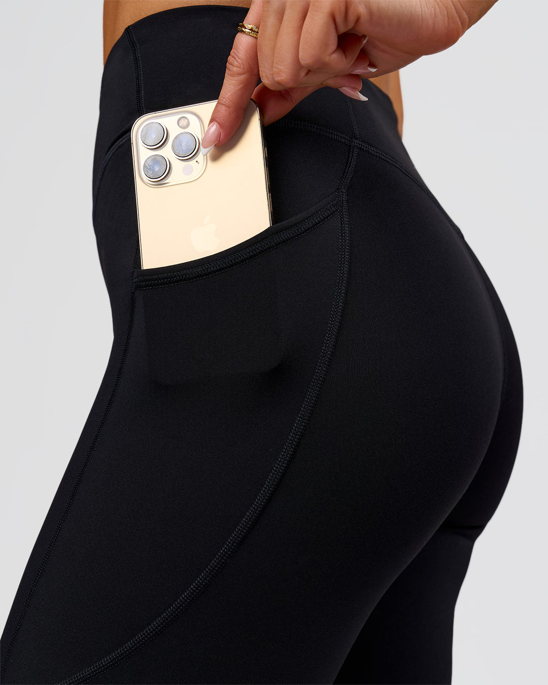 Woman wearing Elite Run High-Rise Full Length Legging Pockets - Black | Model:Bianca | Size:S - view 3