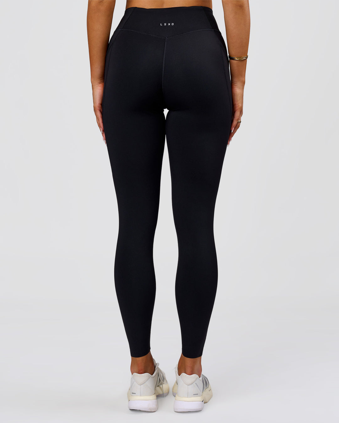 Woman wearing Elite Run High-Rise Full Length Legging Pockets - Black | Model:Bianca | Size:S - view 13