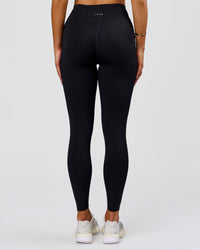 Woman wearing Elite Run High-Rise Full Length Legging Pockets - Black | Model:Bianca | Size:S | Thumbnail Index: 12