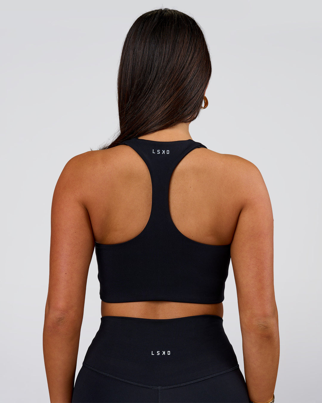Woman wearing Flow Long Line Sports Bra - Black | Model:Bianca | Size:S - view 7