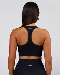 Woman wearing Flow Long Line Sports Bra - Black | Model:Bianca | Size:S | Thumbnail Index: 6