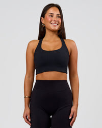 Woman wearing Flow Long Line Sports Bra - Black | Model:Bianca | Size:S | Thumbnail Index: 8