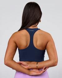 Woman wearing Flow Long Line Sports Bra - Future Navy | Model:Bianca | Size:S | Thumbnail Index: 3