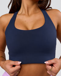 Woman wearing Flow Long Line Sports Bra - Future Navy | Model:Bianca | Size:S | Thumbnail Index: 4