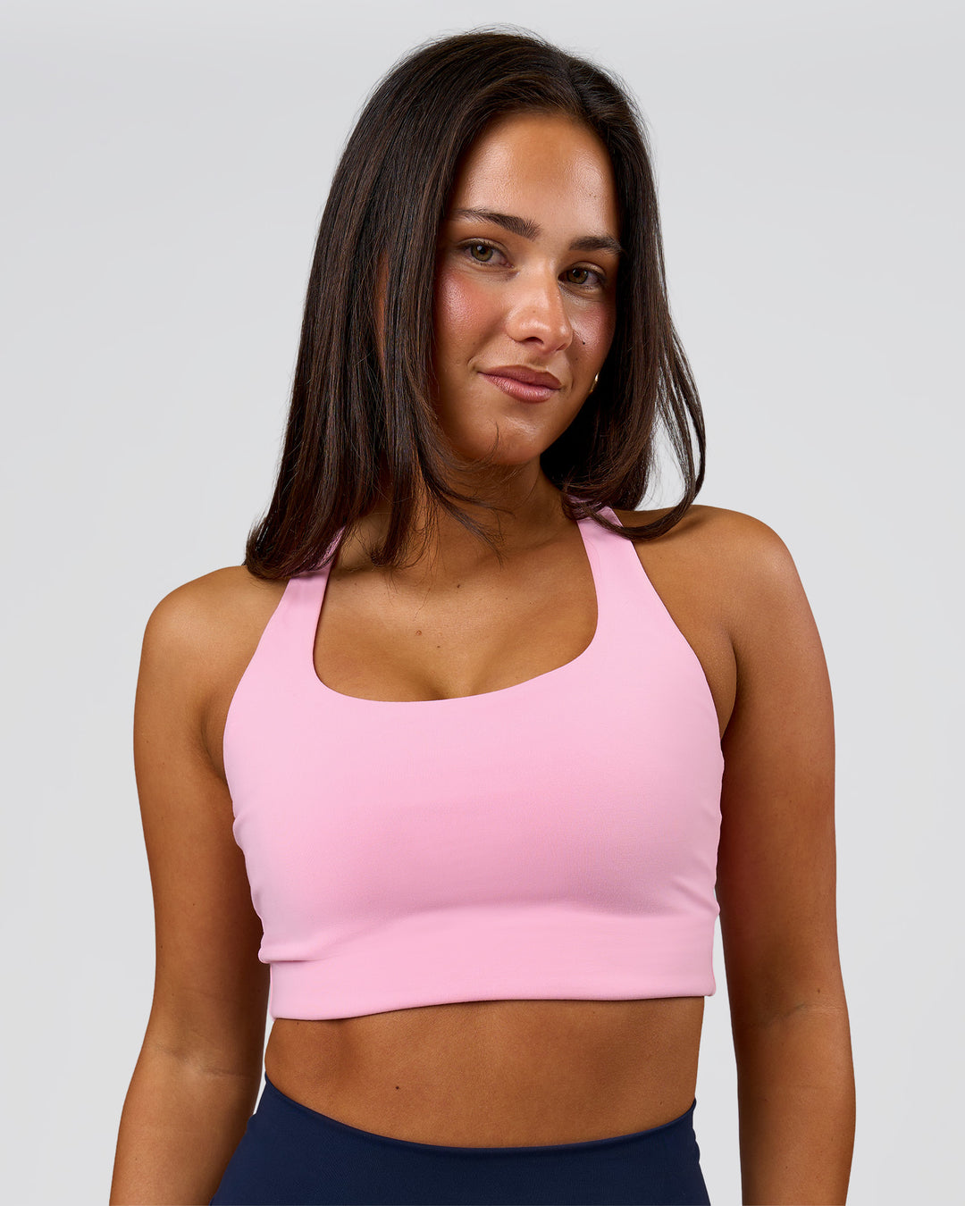 Woman wearing Flow Long Line Sports Bra - Pink Rose | Model:Bianca | Size:S - view 3