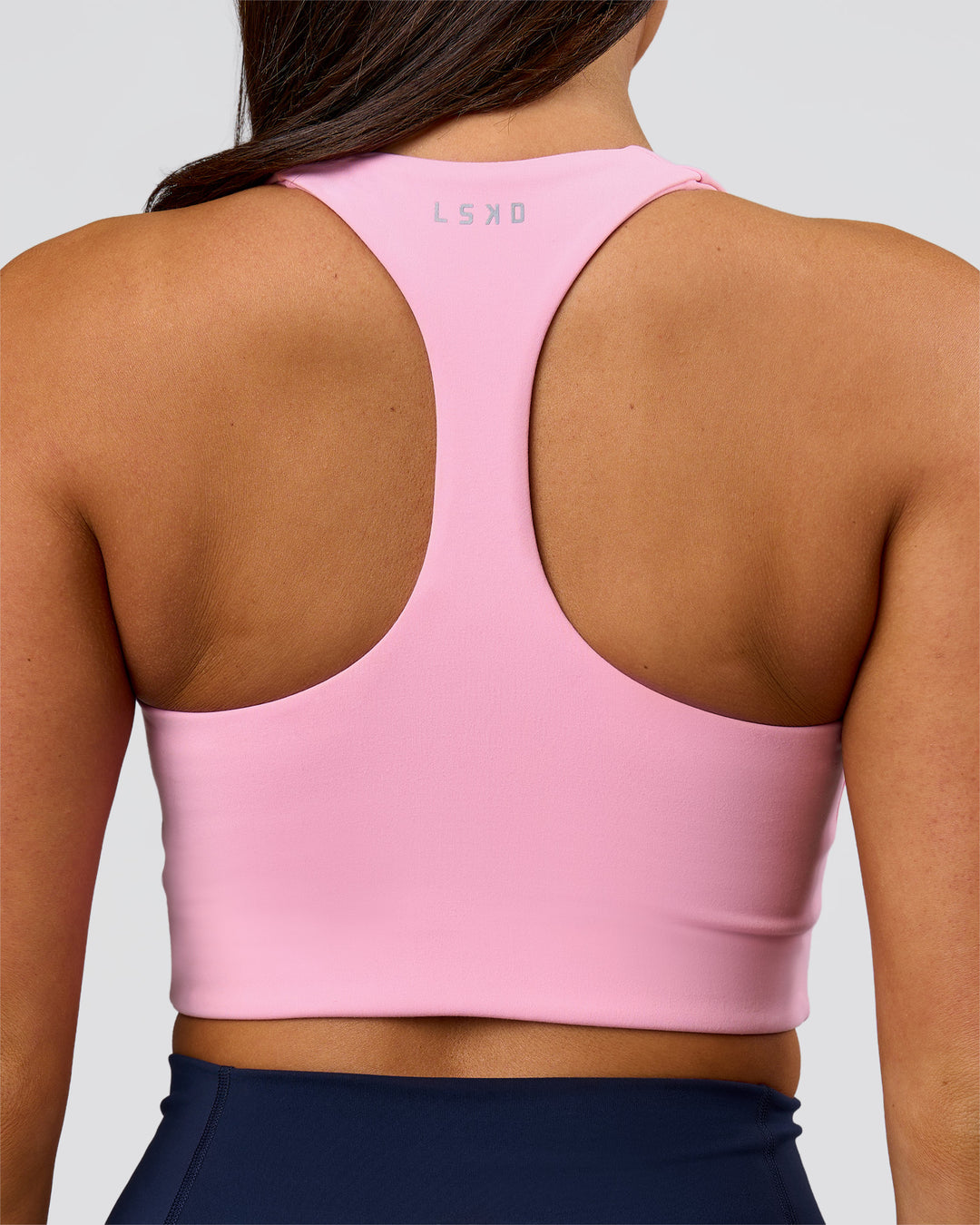 Woman wearing Flow Long Line Sports Bra - Pink Rose | Model:Bianca | Size:S - view 5