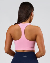 Woman wearing Flow Long Line Sports Bra - Pink Rose | Model:Bianca | Size:S | Thumbnail Index: 1