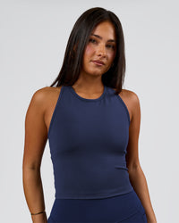 Woman wearing Flow Performance Shelf Bra Tank 2.0 - Future Navy | Model:Bianca | Size:S | Thumbnail Index: 5
