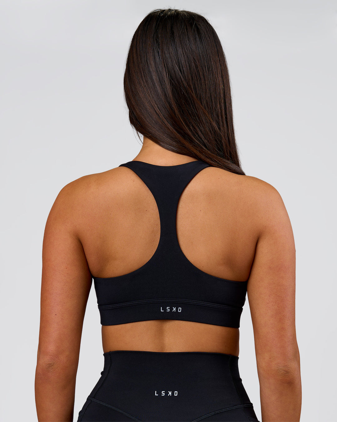 Woman wearing Flow Sports Bra - Black | Model:Bianca | Size:S - view 6