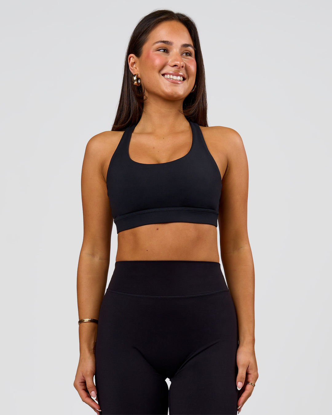 Woman wearing Flow Sports Bra - Black | Model:Bianca | Size:S - view 4